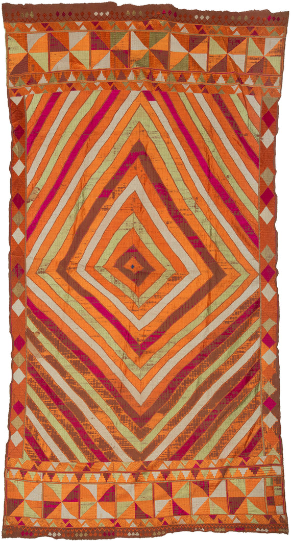 Phulkari is a tradition of folk embroidery from the Punjab region that encompasses both India and Pakistan. It is composed of colorful silken thread atop rough cotton cloth. Bagh is a particular type of Phulkari where the silk embroidery thread completely covers the cotton making the base barely visible. Baghs were often intended to be worn for special events like weddings. 

This bagh was crafted in three strips and features a large wonky central diamond full of personality and charm. Framed by a top 