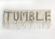 Tumble centers on careful stewardship of textiles, both heirloom quality and everyday clothing items. Keeping in mind notions of cultural heritage, matrilineal inheritance, muscle memory, and shared links between language and cloth, the works mine words and phrases from the care tags of bras. The words are isolated from their full context and rendered in colorful weaving and lace to allow them to float between literal handling instructions and small poems about care and intimacy in the time of a pandemic.