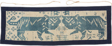 A striking central panel from a ceremonial blanket woven by the Thái ethnic community of Nghệ An, in the highlands of central Vietnam. Worked in a restrained palette of indigo blue and natural white cotton, the textile combines powerful animal imagery with auspicious geometric motifs, creating a composition that is both graphic and deeply symbolic.

The panel is organized around a mirrored pair of confronting tigers, their bodies rendered in bold, angular forms across the center of the composition. Above th
