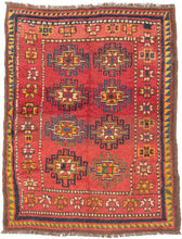 This Kurdish Yatak was handwoven in Eastern Anatolia during the late 19th century.

A vibrant and expressive Kurdish Anatolian Yatak, woven in the highland villages of Eastern Anatolia and originally intended as a sleeping or bedding rug. The format is classic with a warm, saturated red field filled with a rhythmic repeat of memling guls outlined in deep indigo and enlivened with saffron, ivory, moss green, and brick tones. The drawing is bold and spontaneous, full of angular hooked outlines and charming tr