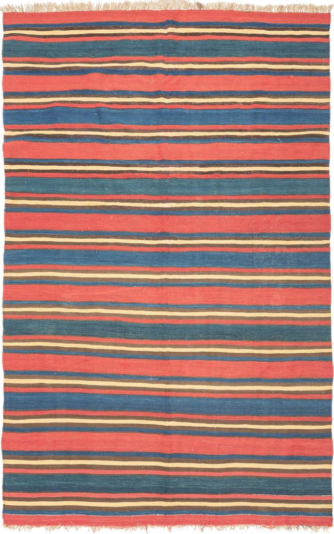 A striking example of simplicity elevated to art, this antique Shahsavan kilim reveals the timeless sophistication of stripe-based design. Its alternating bands of madder red, indigo blue, golden ochre, and earthy brown create a bold yet harmonious rhythm across the surface. The restrained palette and unbroken horizontality give the piece a modernist clarity that feels as relevant today as it did over a century ago.