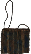 A vibrant Yoruba beaded and woven shoulder bag from Nigeria, featuring a fully beaded pictorial front and a handwoven dyed cotton back. The front panel depicts a lively scene centered on a stylized horse, shown beside a vessel that may represent a feed or water bucket, with two figures and a bird nearby.