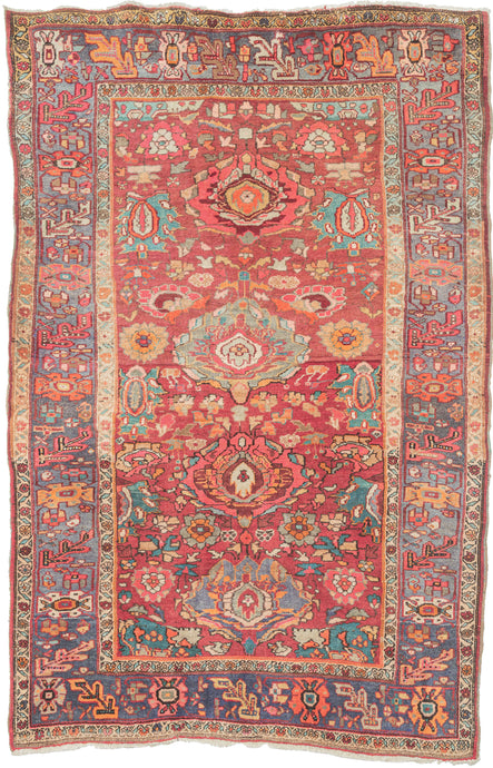 psychedelic bidjar It features large stylized palmettes that unfurl into the kaleidoscopic composition bursting with color, energy and charm. The jewel toned palette of is a saturated symphony of rose, coral, aqua, orange, butter and violet tones layered across a nicely abrashed red ground and framed by a dusty lavender border. A dense, hard wearing rug perfect for high traffic areas.