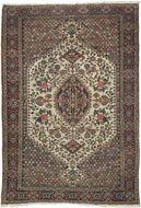 This finely woven Bakhtiari rug is distinguished by its elegant ivory medallion field framed by richly ornamented millefleurs corner spandrels. Graceful vinery and abundant gul farang (“foreign flower”) cabbage roses fill the composition, creating a refined balance between geometric structure and naturalistic floral ornament.