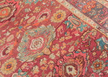 psychedelic bidjar It features large stylized palmettes that unfurl into the kaleidoscopic composition bursting with color, energy and charm. The jewel toned palette of is a saturated symphony of rose, coral, aqua, orange, butter and violet tones layered across a nicely abrashed red ground and framed by a dusty lavender border. A dense, hard wearing rug perfect for high traffic areas.