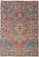 This classic Heriz features a geometric central medallion&nbsp;set against a richly layered field of angular vines, stylized leaves, and geometric blossoms.&nbsp;The palette is both vibrant and balanced with coral and madder reds forming the backdrop, while sky blue and deep indigo provide striking contrast. Soft accents of ivory, green, and gold animate the details, giving the rug a depth and luminosity.