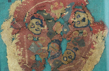 This Coptic textile was woven in Egypt or the Levant during the 6th-7th century AD.&nbsp;

It features a roundel with various faces and vegetal motifs on a earthy red ground. It is framed by rounded borders including a main latchhooked border. With tones of green, purple and yellow to go with the wheat colored linen classically found in these textiles.&nbsp;