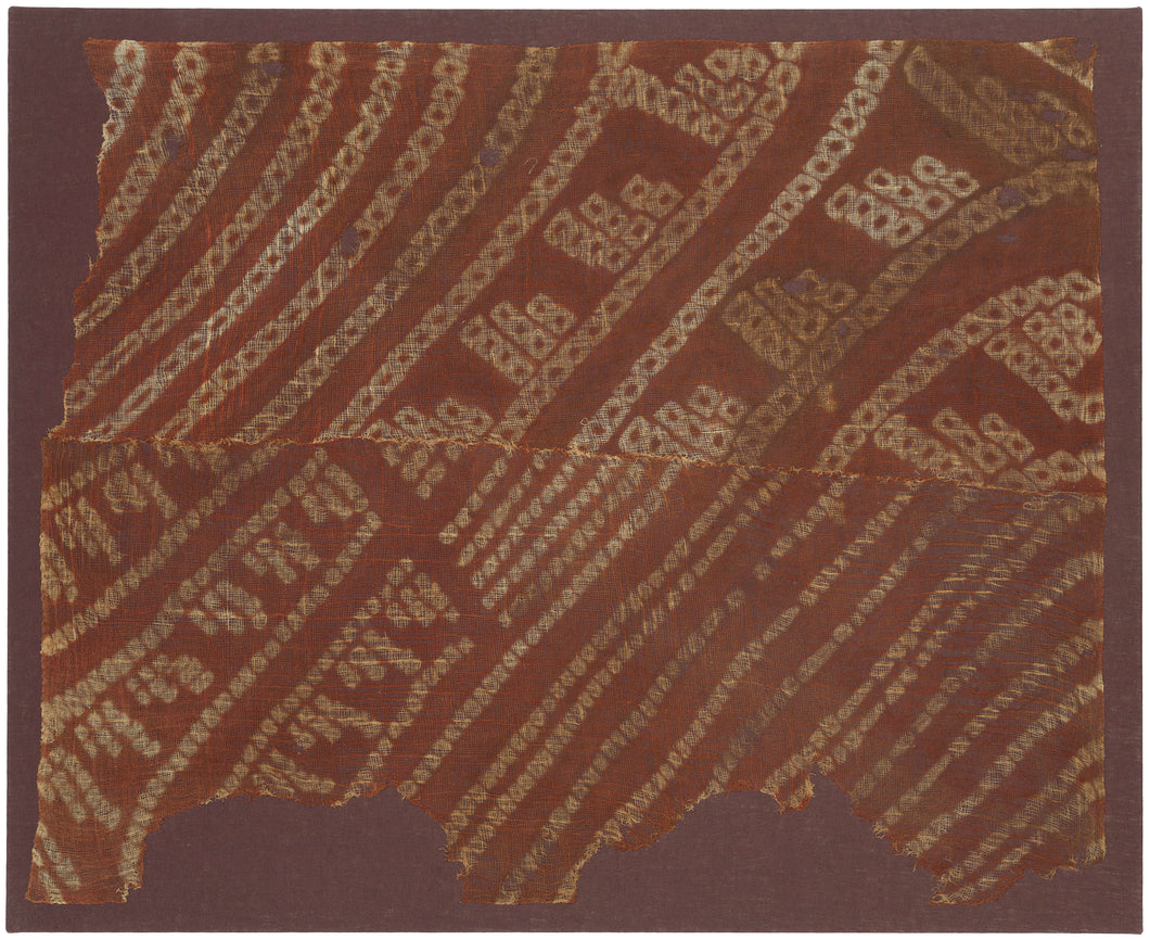 Created using a sophisticated resist-dye technique, the design reveals the remarkable precision and technical mastery of Wari textile makers. The sheer, open weave lends the composition an ethereal quality, while its beautifully weathered surface offers a tangible connection to the ancient Andean world. ￼
