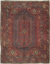 Khamseh rug featuring a strong geometric central design with octagons in various sizes in a palette of red, blue, green, yellow, ivory, and brown. Five large eye-catching octagons are the most prominent and each are filled with the same protection symbol. The field is framed by a main border of floral motifs that are blossoming in pairs flanked by matching minor borders of diagonal stripes each filled with three boxes outlined in contrasting tones.