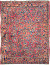 A refined and authoritative example of 1920s Sarouk weaving, well suited to anchoring a room with both elegance and visual richness. It features a dense, symmetrical arrangement of scrolling vines, palmettes, and floral sprays organized around a clearly articulated yet well-blended central medallion. The composition is balanced and expansive, with a sense of movement that carries easily across the larger scale without becoming heavy or overcrowded.