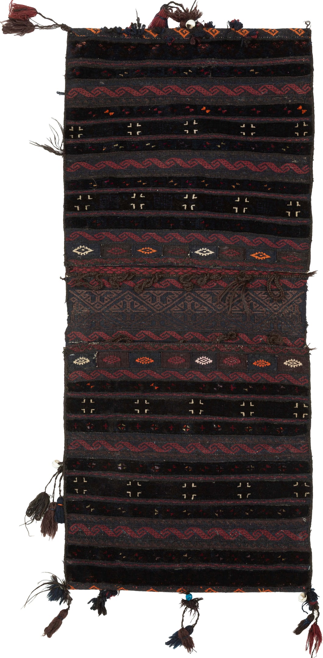 A richly textured saddle bag from Afghanistan with silky wool, woven in a dark, atmospheric palette of deep brown, black, aubergine, red, and indigo tones. The design is arranged in vertical bands with small geometric motifs, zigzag borders, diamond forms, and subtle embroidered details.