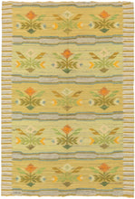 This Rölakan was handwoven in Sweden during the middle of the 20th Century.

A beautifully balanced Scandinavian flatweave featuring soft, luminous tones of straw yellow, pale green, sky blue, and warm ochre. The design is arranged in horizontal bands of stylized floral motifs, framed by subtle striped edges in an unmistakable nod to mid-century Swedish weaving traditions. The palette is intentionally gentle and airy, giving the piece a fresh, understated presence that works effortlessly in contemporary int