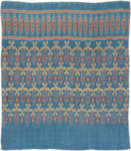 This elegant silk pha sin or traditional tube skirt was handmade in northeast Thailand during the middle of the 20th century.

It is a masterful example of mudmee (ikat) weaving from the Isaan region. The main field (phuen sinh) showcases a staggered arrangement of stylized vegetal or flame motifs in golden ochre and brick red, which is an elegant reinterpretation of classic Lao-Tai design language passed down through generations of Isaan weavers.

The upper band (hua sinh) is particularly dynamic with a ro