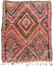 It features a bold diamond design in a striking palette of magenta, orange, black and ivory, accented with intricate lattice and geometric motifs. The vibrant colors and dynamic patterning reflect the artistic spirit of the Zemmour weaving tradition. In a very rare large squarish size.&nbsp;Perfect for adding energy and warmth to any space.&nbsp; A very free-spirited weaving.