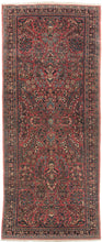 This rug showcases a classic curvilinear floral design on a deep red field beautifully detailed with scrolling vines, palmettes, and blossoming sprays. This classically patterned rug is perfect for high traffic areas and should last for generations to come. It's rare short runner size makes it perfect for an entryway, kitchen or as a statement piece in a more intimate space.