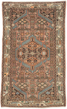 A lively small Hamadan with a geometric medallion composition set against a warm rose-brown field. Crisp ivory, turquoise, deep brown, and soft orange accents create strong contrast and rhythmic movement across the surface.
