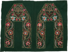 This vibrant green wool panel is richly adorned with colorful chain-stitch embroidery and was originally intended as the upper portions of traditional Kashmiri slippers (jooti or khussa). The bold floral motifs—rendered in vivid coral, blue, crimson, and ivory silk threads are enclosed within sweeping arabesques and stylized lotus forms, all outlined with gleaming metallic thread.