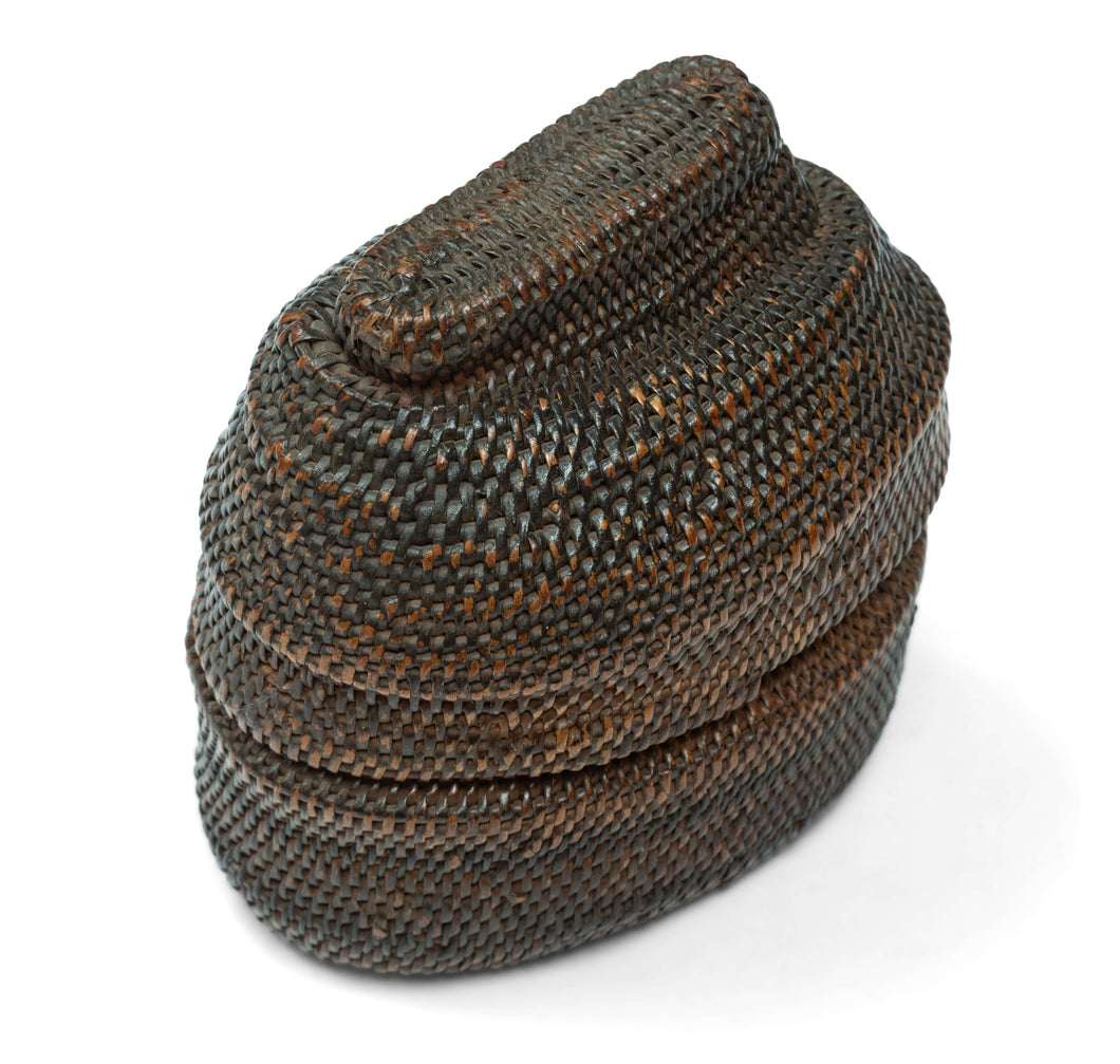 A finely made lidded basket attributed to the Kuba peoples of the Democratic Republic of the Congo, tightly plaited from raffia palm fiber and finished with a fitted cover and raised woven grip.