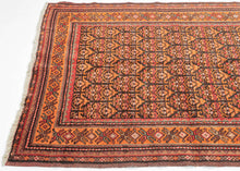 This rug was handwoven by the Kurdish weavers of Kolyai during the middle of the 20th century.

It features an all over design of abstracted floral motifs. In an uncommon and perfectly patinated palette of terracotta, aubergine, watermelon, teal and charcoal. With an enduring elegance that makes it equally suited for both eclectic interiors or more classic settings.