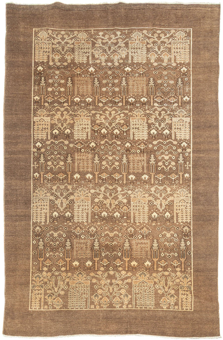 This striking vintage Bid Majnūn rug is inspired by the celebrated Bid Majnūn (“Weeping Willow”) design, featuring orderly rows of stylized willow trees interspersed with flowering plants across a rich chocolate-brown field. Woven in a restrained palette of chocolate, ivory, taupe, and warm beige, the composition possesses a quiet elegance and remarkable sense of rhythm.