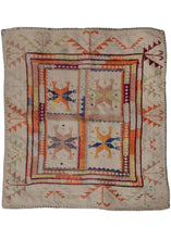 Afghani Hazara embroidered hankercheif featuring a motif reminiscent of hands. Hands are a common motif in this medium and are meant to represent the hands of Abbas, a Shi'a martyr killed in the battle of Karbala in 681 AD. These cloths were intended to hold turbah, a stone that shi'a muslims use in prayer.