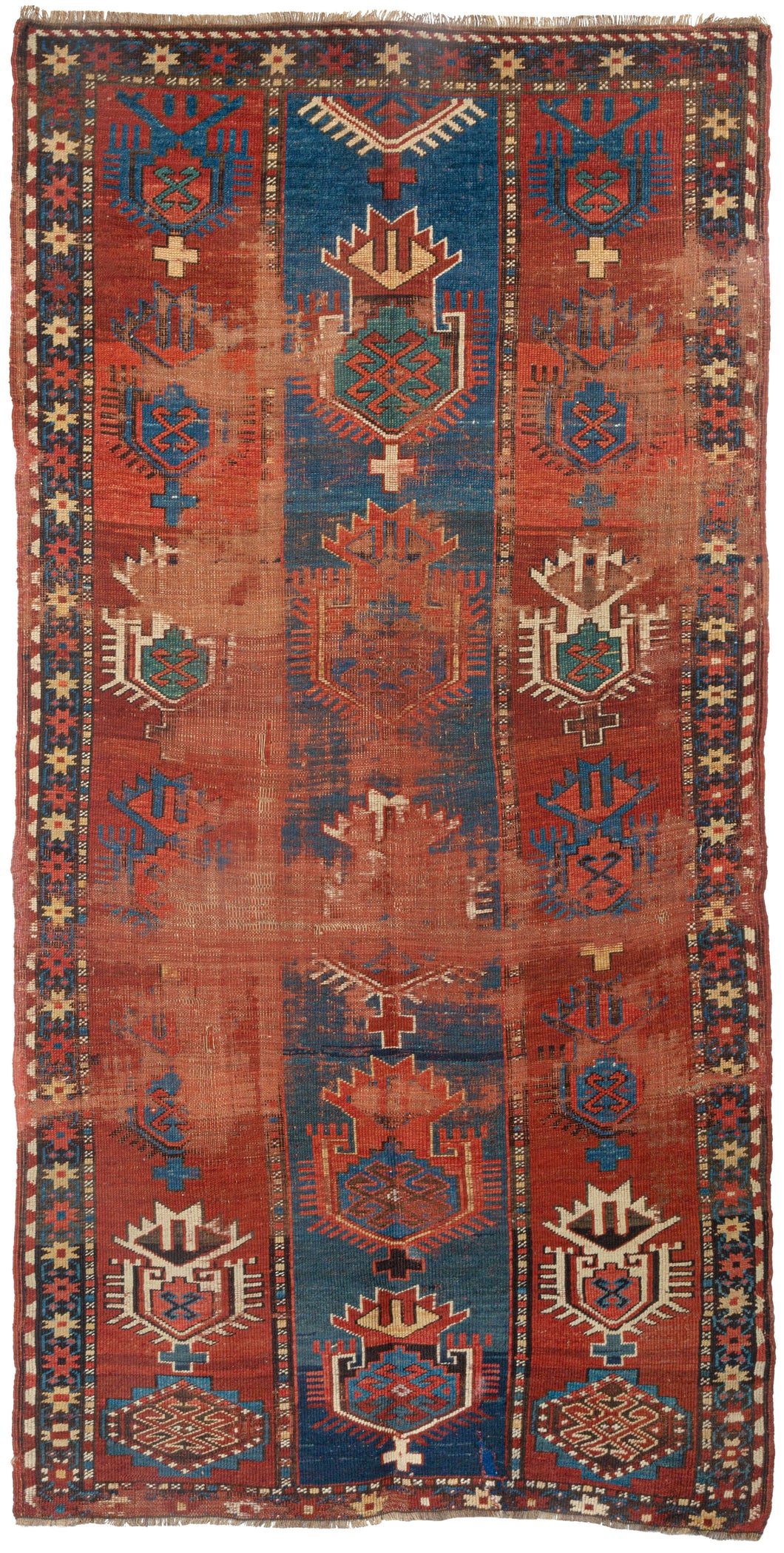 Caucasian rug handwoven in the mid-19th century. Rare design with a red weft. Likely a production of the Kurmanji Kurds. This rug displays signs of wear consistent with its age, as pictured, but the edges have been recently reinforced. 