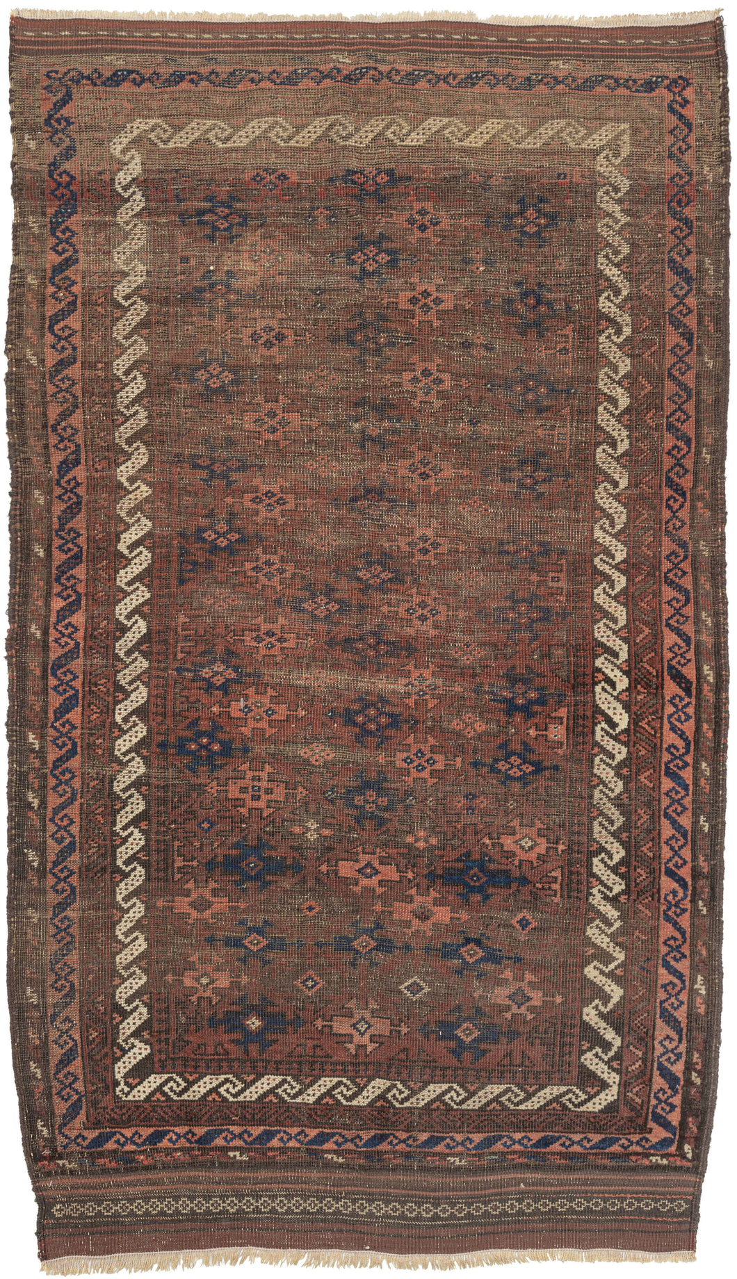 This Baluch rug was handwoven in Afghanistan during the second quarter of the 20th century.   This rug features an all-over field of geometric devices in blues, pinks and browns on reddish brown ground. Framed by multiple borders including meandering 