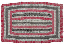 Antique rare Bengali Kantha referencing Ram or Rama who is one the most popular Hindu deities and likely intended as a mantra in "Puja" or prayer.  It has a limited palette of various red and black threads on plain white cotton ground. The red and black threads were likely harvested and reused from old clothing.  The limited palette is used to hypnotic effect by use of large blocks as well as patterning that appears almost three dimensional including one of the central rows which features a cube form.