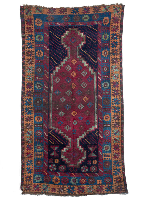 Antique Central Anatolian Turkish rug with deep eggplant, gold and blue tones handwoven area rug