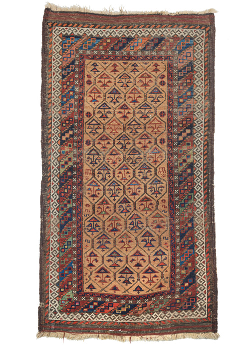 Antique ceremonial camel ground Baluch scatter rug featuring a camel ground and a geometric trellis motif. Each hexagon contains a tree shape in various colors, ranging from indigo to red, to green. The multicolor diagonal border is reminiscent of the candy-cane border found in Kurdish rugs. 