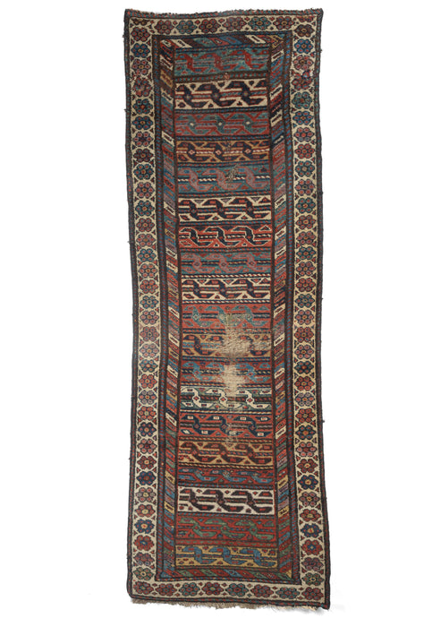 Antique NW Persian Shahsavan runner with colorful stripes and shapes annd a flower outter border