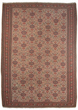 Antique Persian Kurdish senneh kilim featuring a calm and satisfying rendition of the classic herati design in reds, pink, yellow, and brown on an ivory ground. The design is composed of an all-over pattern in the classic Herati style. The major border contains simple floral shapes and botehs on a red ground, while the minor borders feature scrolling rosettes. This may be the finest woven Senneh we have handled. So fine that it folds like a sheet.