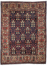 Antique NW Persian Malayer area rug with colorful border and allover floral design