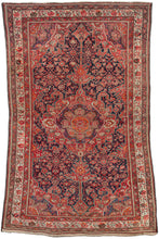 Antique NW Persian Malayer Area Rug featuring an ornate central medallion and cornices on herati patterned field. The design is primarily rendered in blues, red, ivory and brown but a variety of accents in soft yellow, purple, green and an impactful orange add nice depth. Three prominent borders are composed of distintive floral meanders, from geometric to naturalistic.