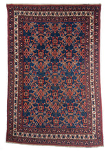 18th century Persian Afshar area rug with gorgeous blue and orange wool, floral design and three floral borders