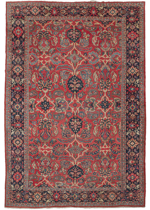 Antique Persian Mahal composed of a large-scale pattern on a vibrant red field. The design appears to be an innovative variation of the Herati pattern in various blues, greens, pink, yellow, and gold. Framed by a border of various colorful palmettes and scrolling leaves on a deep surmah ground. A very vibrant and energetic piece that truly sparkles.