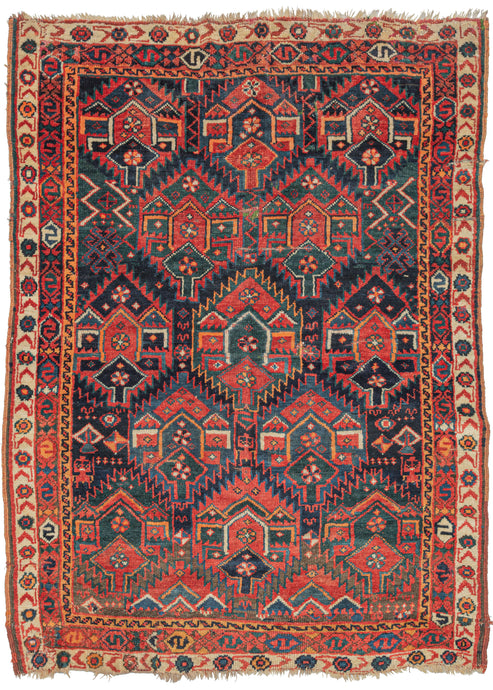 Antique Persian Kurdish Sauj Balug rug featuring staggered rows of 