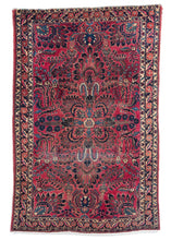 West Persian handwoven wool Sarouk rug with central medallion and pink field characteristic of Sarouk and Lillian rugs