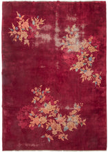 Red Chinese Deco roomsize rug featuring a detailed naturalistic design of distinct blossoming branches asymmetrically arranged on a bright red field. The eye-catching design features peonies, chrysanthemums, and fruit blossoms among flowers rendered in pinks, yellows, and blues. Subtle tone-on-tone flowers can be found under each blossom adding depth.