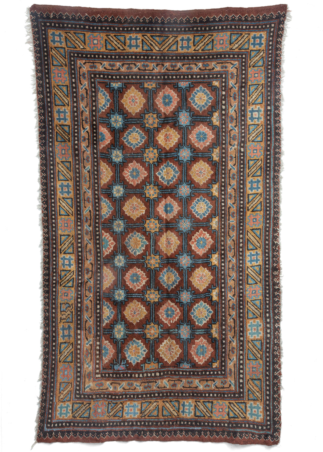 Antique Gansu woven Tibetan meditation nmat with an allover design of pinnk yello wand blue flowers in a grid of brown field, also with a yellow border with hashtag graphics