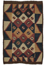 This Antique Labijar Kilim features a bold and graphic pattern of interwoven diamonds filled with saturated tones of navy, red-orange, or ivory.  Each diamond contains a small polygon with a central "x" like device. It is framed by wide side borders of right triangles which sandwich smaller borders of right triangle segments on the top and bottom. The composition is finished with a perimeter of undyed brown wool.