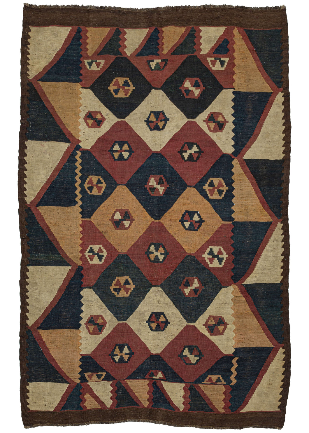 This Antique Labijar Kilim features a bold and graphic pattern of interwoven diamonds filled with saturated tones of navy, red-orange, or ivory.  Each diamond contains a small polygon with a central 