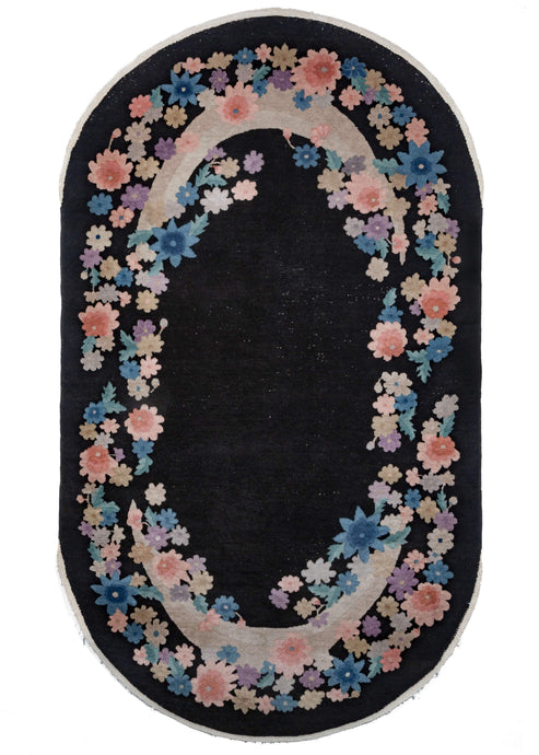 Chinese Art Deco Black Oval Rug with cut flowers and crescent moons