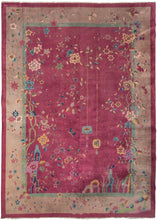 This Deco rug was handwoven during the 1930s in Tientsin, China.  It features a soft maroon ground with a calm mauve border. The design is directional and whimsical which is not restrained by the border. Across the bottom are a variety of lively scholar stones, various vegetation and even a small bird. Large palmettes blossom from curving vines around the perimeter and two lanterns hang to the right side of the rendering.Truly a statement piece, this rug will liven up any room.