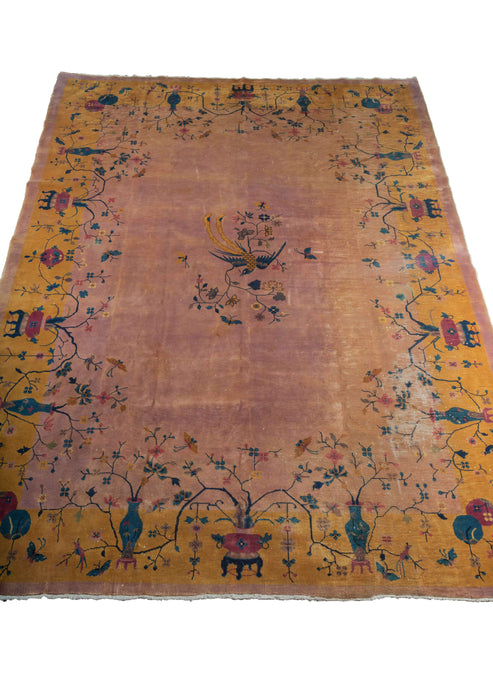 Chinese Deco rug with peachy lavender and golden border
