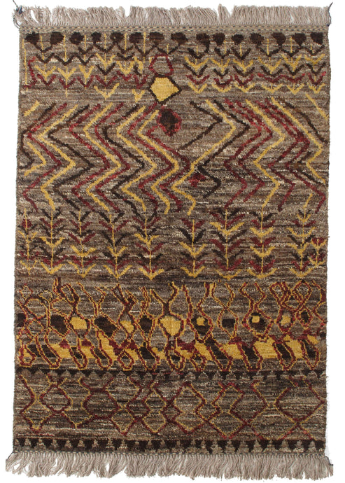 Contemporary Modern handwoven Afghani area rug with an undyed brown field and undulatinng floral pattern in yellow red and black