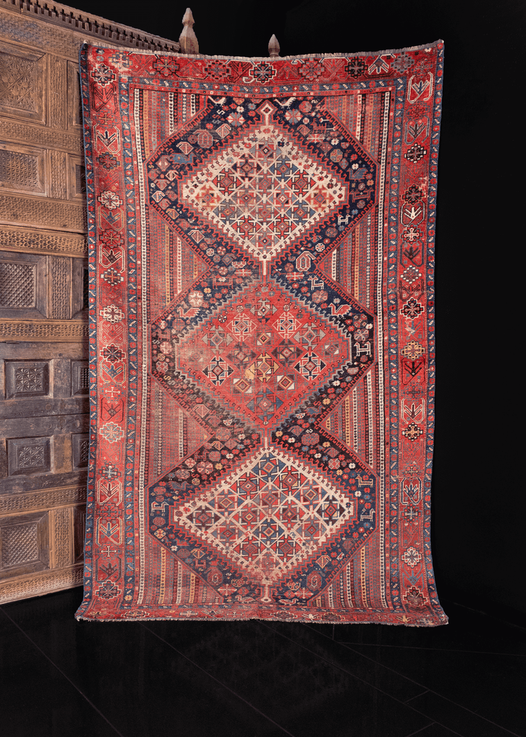 multicolor khamseh rug from early 20th century. three central medallions on a multicolor vertical stripe field