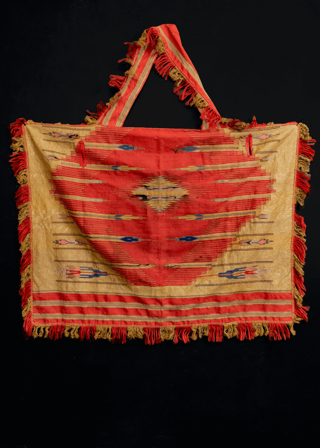 Syrian horse-trapping woven in red and gold metallic thread, in fair condition, with some wear throughout