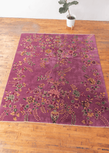 Chinese deco rug with purple field and large scale curvilinear floral motifs in excellent condition with no signs of wear