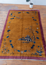 Chinese Deco rug with golden yellow field and pink border. Minimal and elegant floral design in blues and whites. in excellent condition